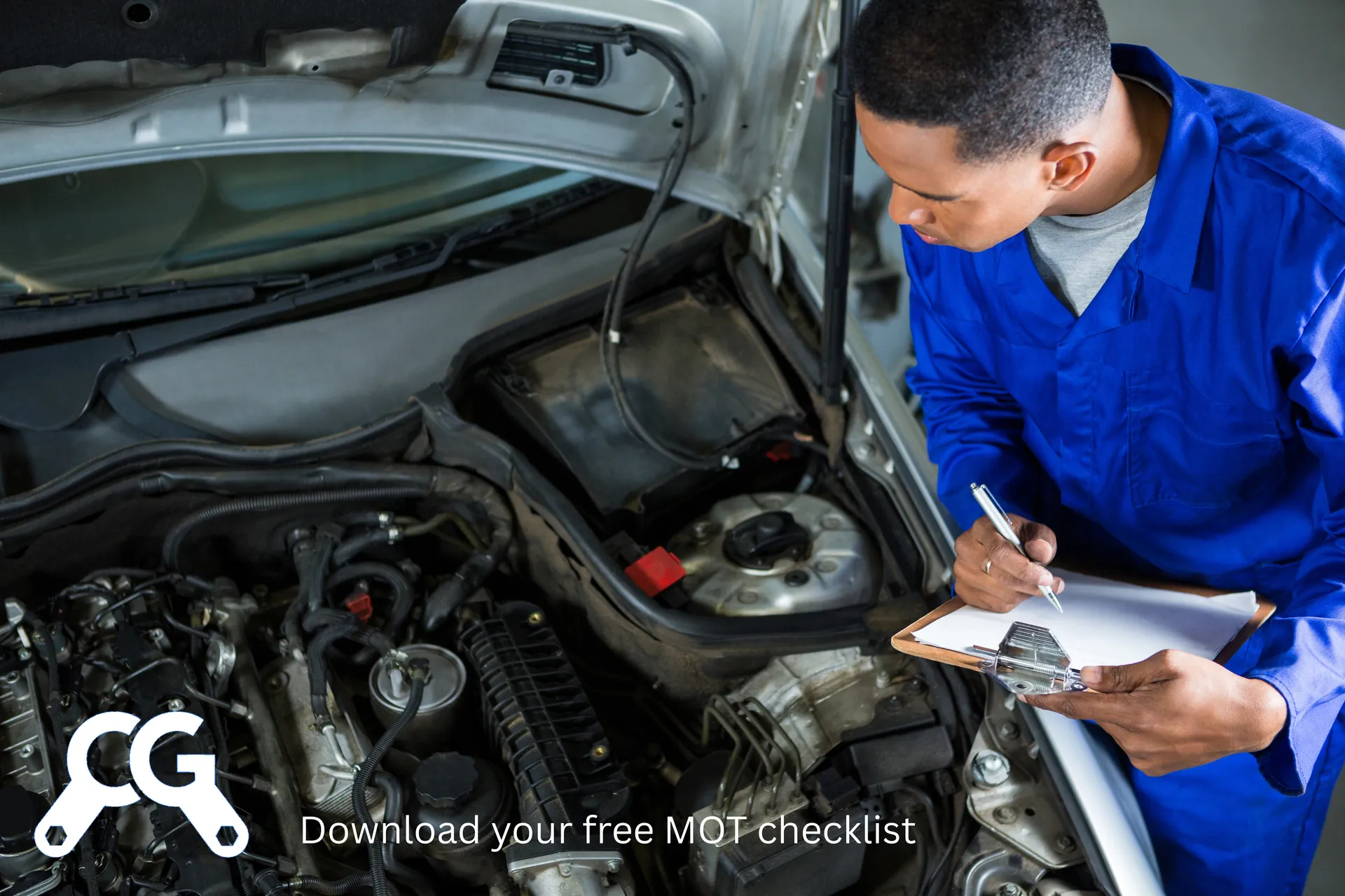 Free MOT checklist download - mechanic completing vehicle inspection checklist